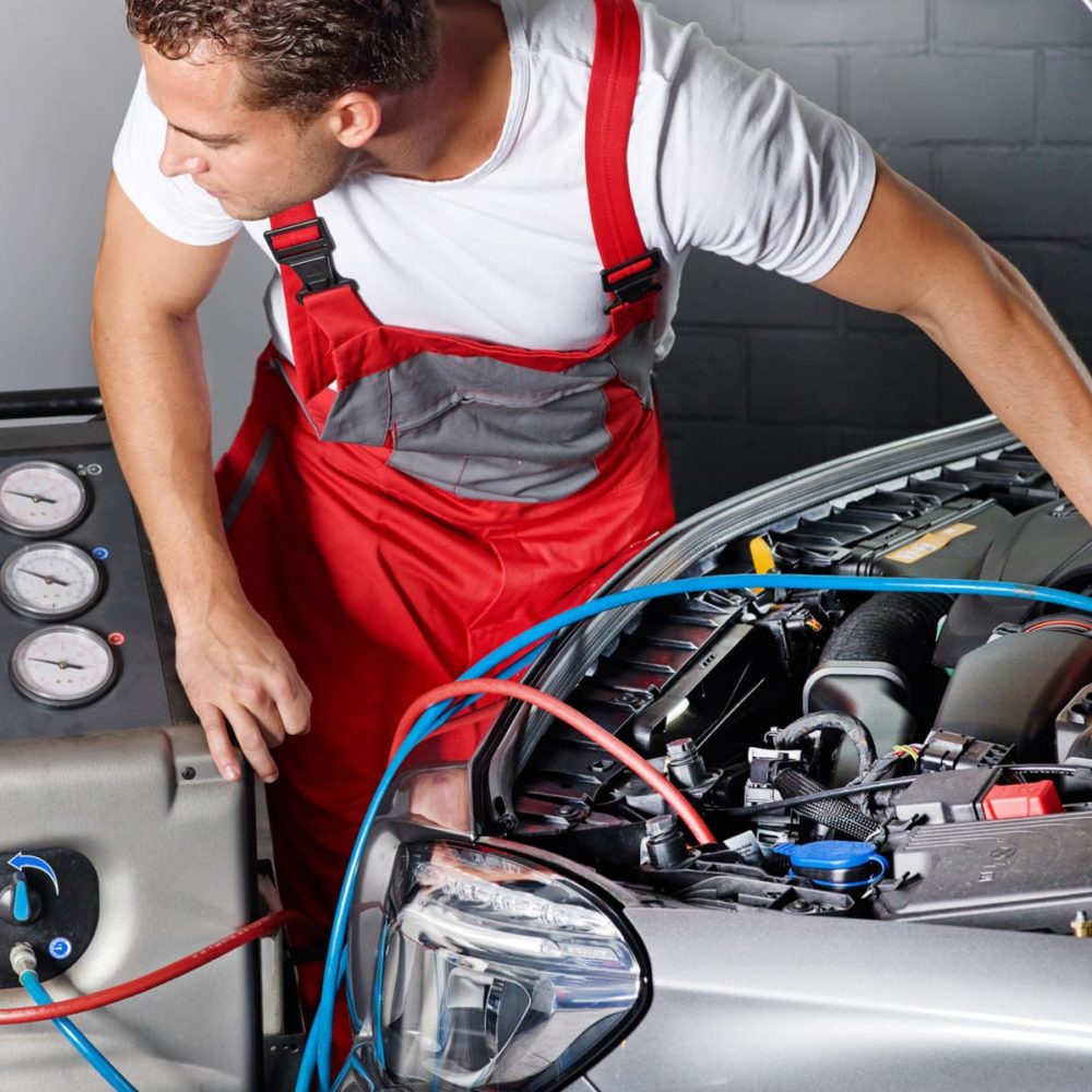 car-mechanic-checks-the-air-handling-unit-of-a-car